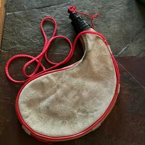 Red and Tan Water Flask with Rope‎